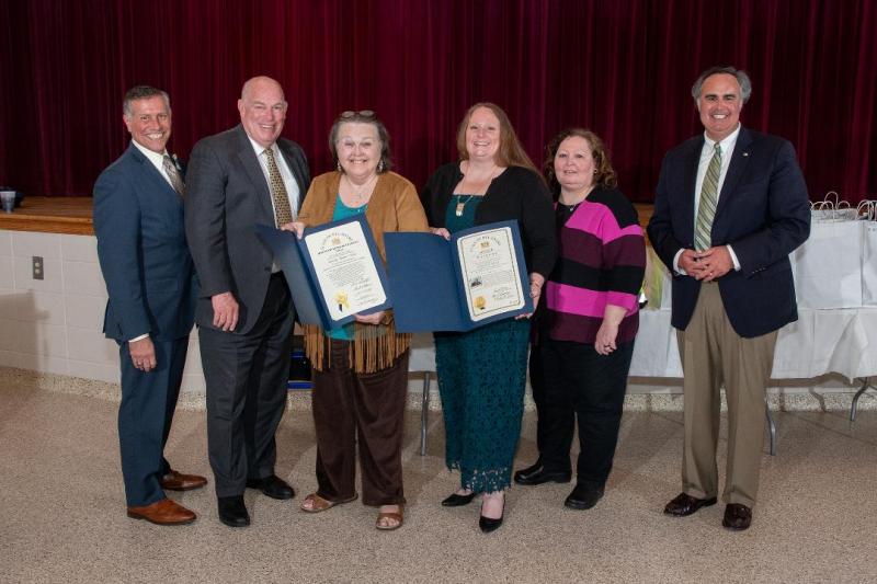 Dottie Neske, a 50-year RBVFC Auxiliary member, receives tributes presented by Rep. Pete Schwartzkopf, D-Rehoboth Beach; Rep. Steve Smyk, R-Milton; and Sen. Ernie Lopez, R-Lewes. Shown are (l-r) Smyk, Schwartzkopf, Neske, Auxiliary President Katy Miller, Auxiliary Vice President Vicki Card and Lopez.